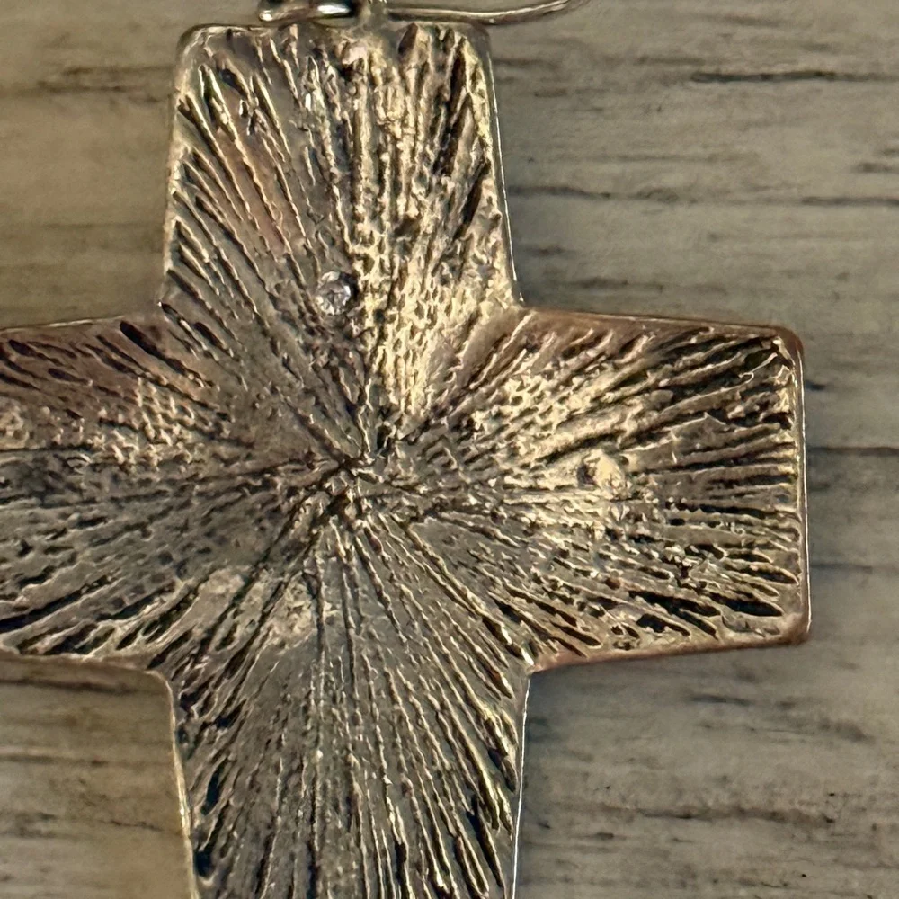 Vintage cross earrings Navajo ,pressed design w/a crystal on back of 1 earring
